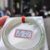 冰透起膠飄花圓骨手鐲